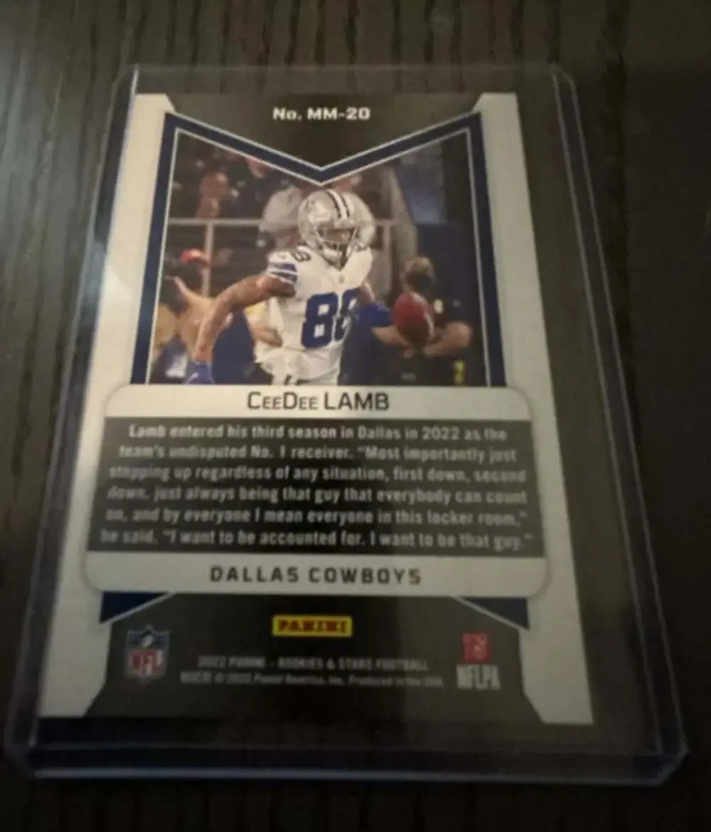 CeeDee Lamb 2022 Panini Rookies & Stars  Man In Motion Serial Numbered 008/125